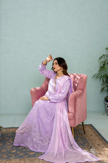 Model posing in Lilac long frock
